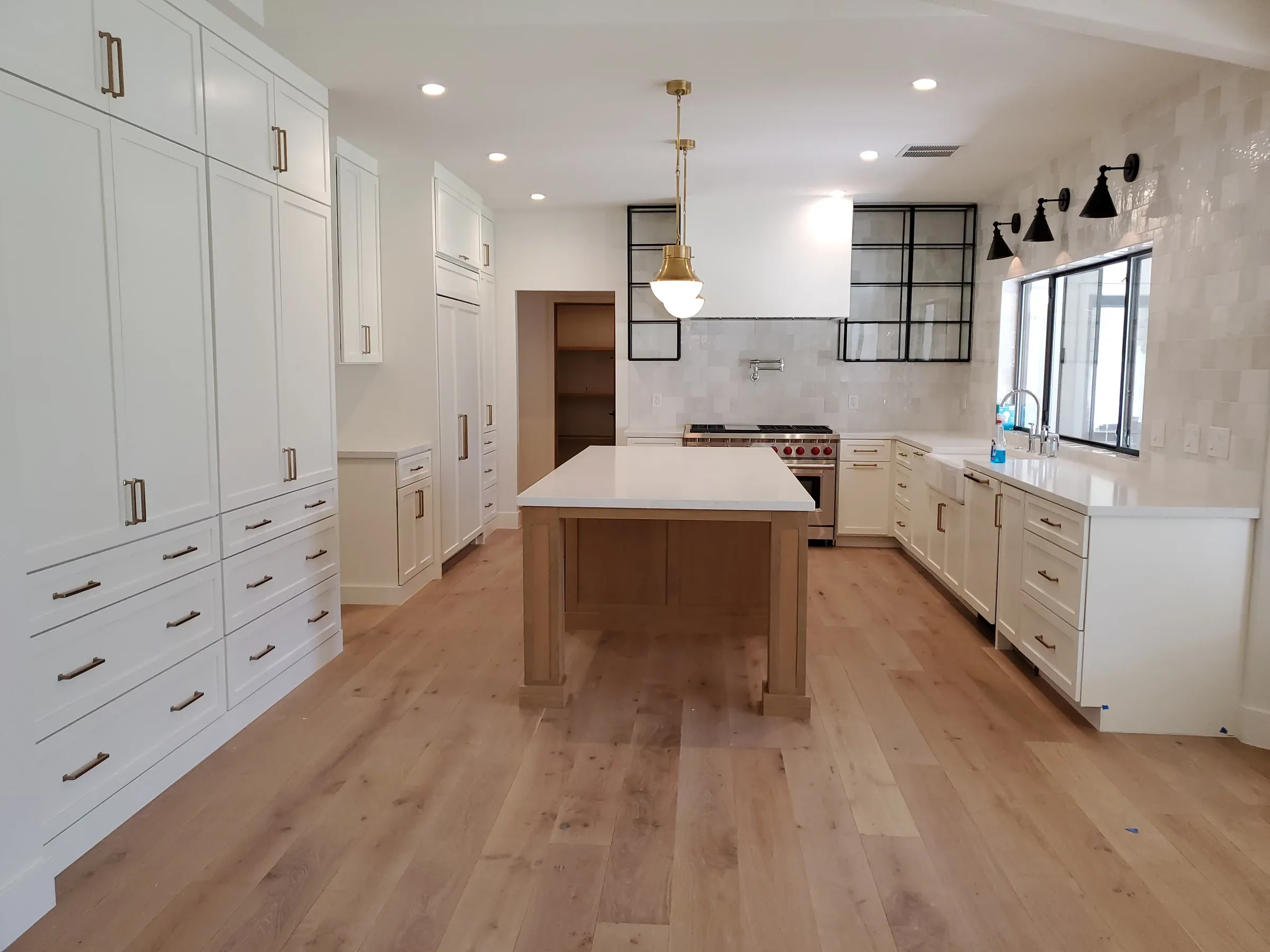 Kitchen and dining space with custom millwork integration